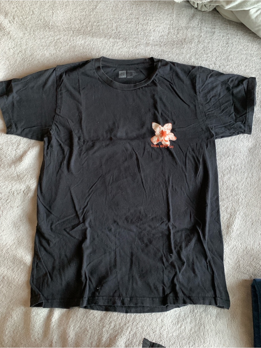 Black T-Shirt with Small Pink Floral Graphic